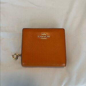 Coach wallet. In original packaging.